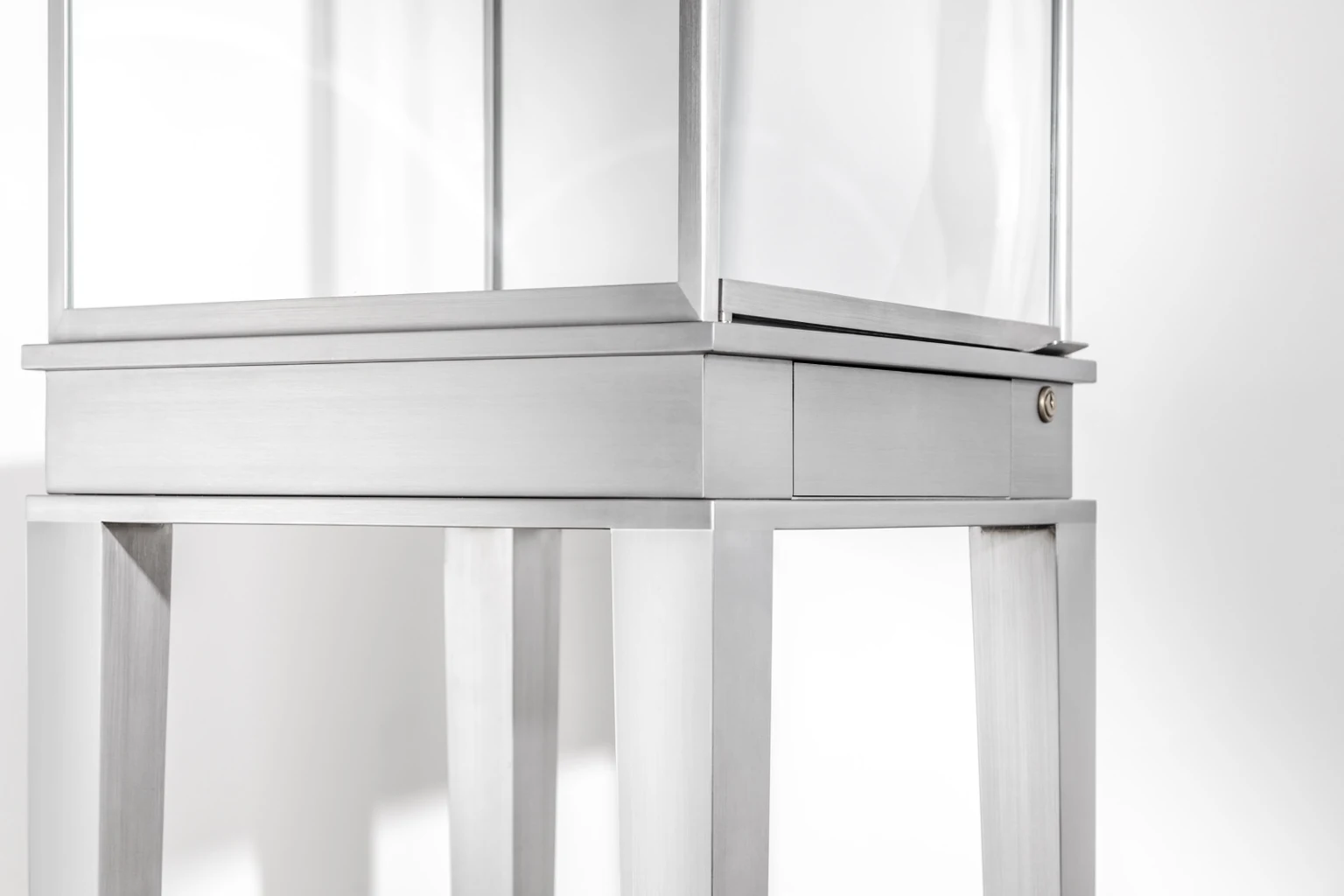 Close view of the showcase door, keyed lock and drawer